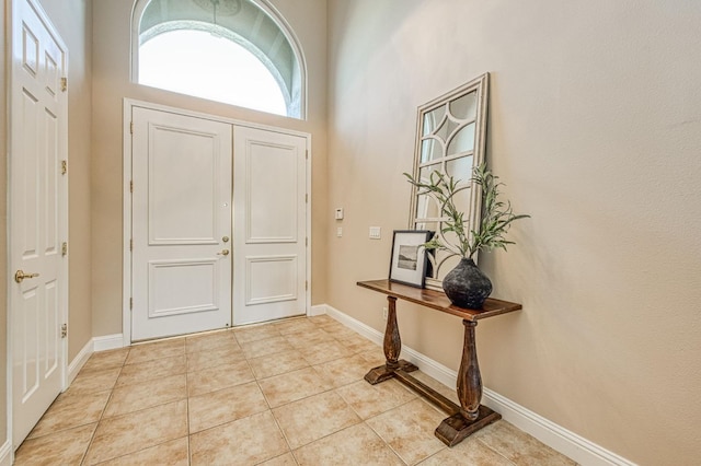 1643 E Shadow Glen Dr, Fresno, CA 93730 - entryway with baseboards and light tile patterned floors