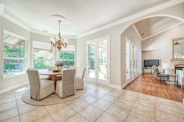 1643 E Shadow Glen Dr, Fresno, CA 93730 - dining room featuring french doors, tile patterned flooring, and a wealth of natural light