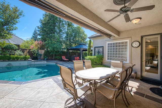 1643 E Shadow Glen Dr, Fresno, CA 93730 - view of pool with a gazebo, ceiling fan, a fenced backyard, a fenced in pool, and a patio area