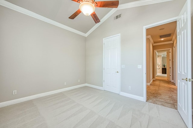 1643 E Shadow Glen Dr, Fresno, CA 93730 - unfurnished bedroom with visible vents, crown molding, lofted ceiling, and light colored carpet