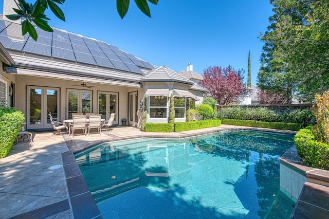 1643 E Shadow Glen Dr, Fresno, CA 93730 - pool featuring a ceiling fan, a patio area, and french doors