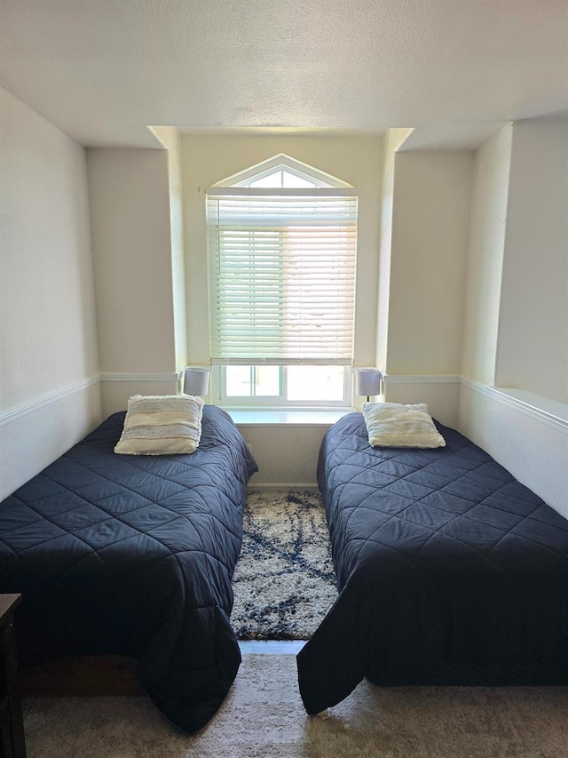 1295 E Athens Ave, Fresno, CA 93720 - carpeted bedroom with a textured ceiling