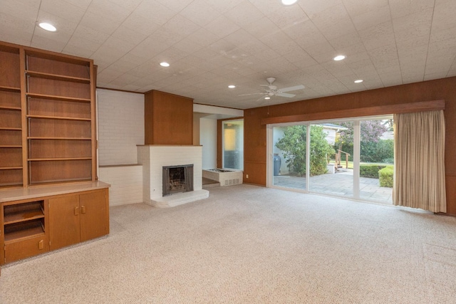 1436 W Keats Ave, Fresno, CA 93711 - unfurnished living room featuring ceiling fan, a brick fireplace, carpet, and recessed lighting