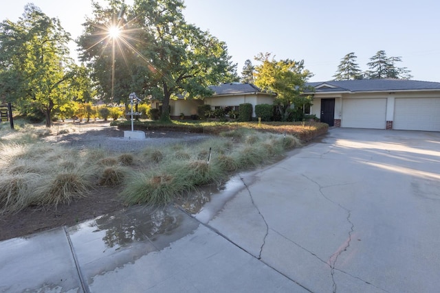 1436 W Keats Ave, Fresno, CA 93711 - view of front of property featuring a garage and concrete driveway