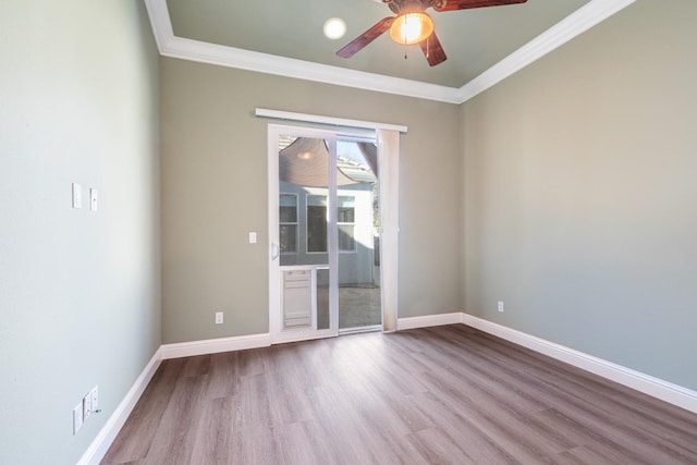 11 W Serena Ave, Clovis, CA 93619 - empty room featuring wood finished floors, ornamental molding, ceiling fan, and baseboards