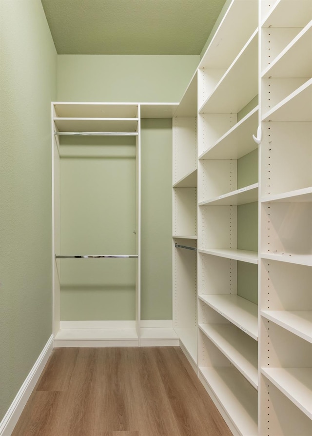 11 W Serena Ave, Clovis, CA 93619 - walk in closet with wood finished floors