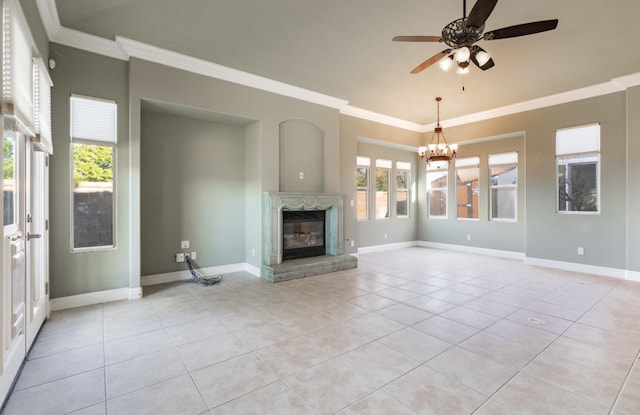 11 W Serena Ave, Clovis, CA 93619 - unfurnished living room with crown molding, a chandelier, ceiling fan, light tile patterned flooring, and healthy amount of natural light