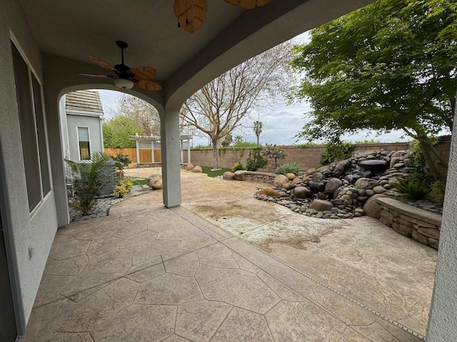 11 W Serena Ave, Clovis, CA 93619 - view of patio / terrace with a ceiling fan and a fenced backyard