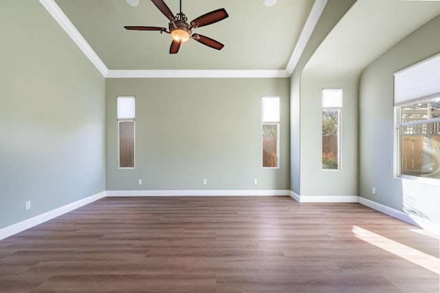 11 W Serena Ave, Clovis, CA 93619 - empty room with crown molding, ceiling fan, wood finished floors, and baseboards