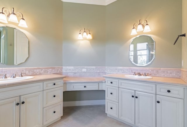 11 W Serena Ave, Clovis, CA 93619 - full bathroom with two vanities, tile patterned flooring, and tasteful backsplash