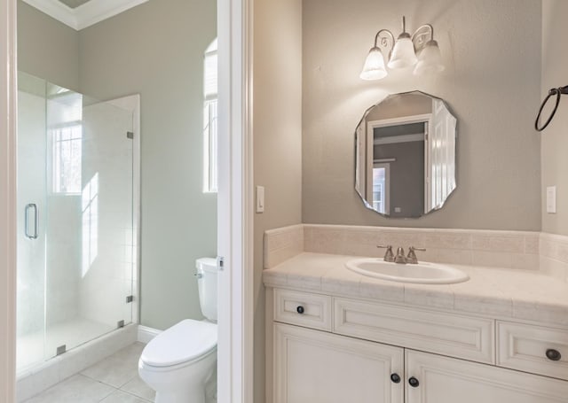 11 W Serena Ave, Clovis, CA 93619 - full bathroom featuring toilet, tile patterned flooring, a stall shower, and healthy amount of natural light