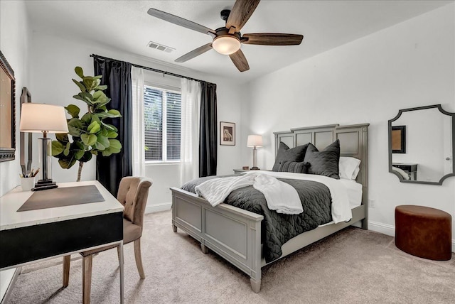 bedroom with light carpet, baseboards, ceiling fan, and visible vents