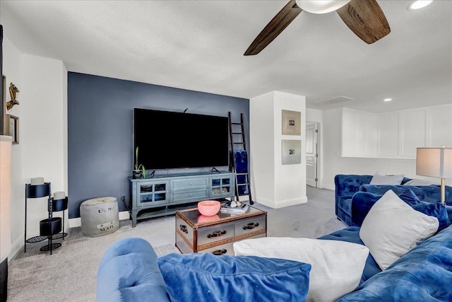 carpeted living room with recessed lighting, baseboards, and ceiling fan