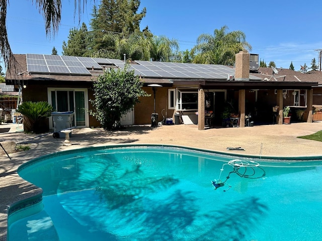 2589 W Barstow Ave, Fresno, CA 93711 - swimming pool featuring a patio