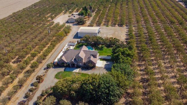 birds eye view of property featuring a rural view