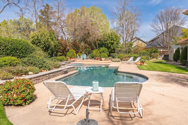 pool featuring a patio area