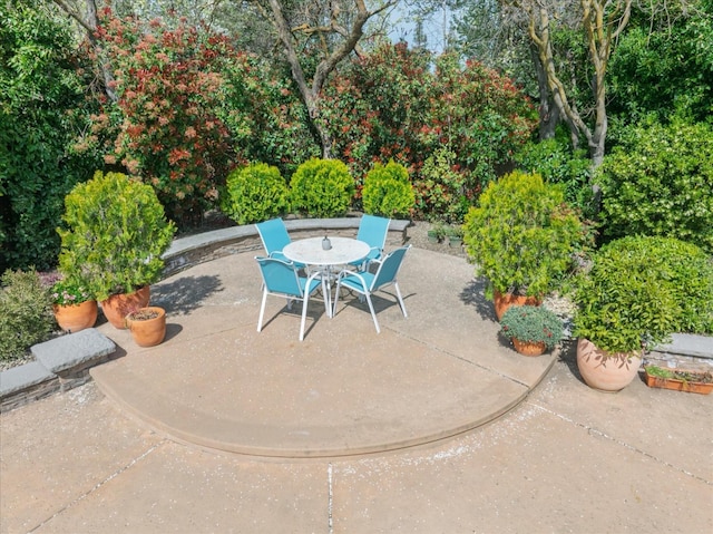 view of patio featuring outdoor dining area