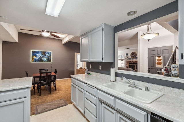 100 Rosewood Cir, Madera, CA 93637 - kitchen featuring light countertops, a sink, and ceiling fan