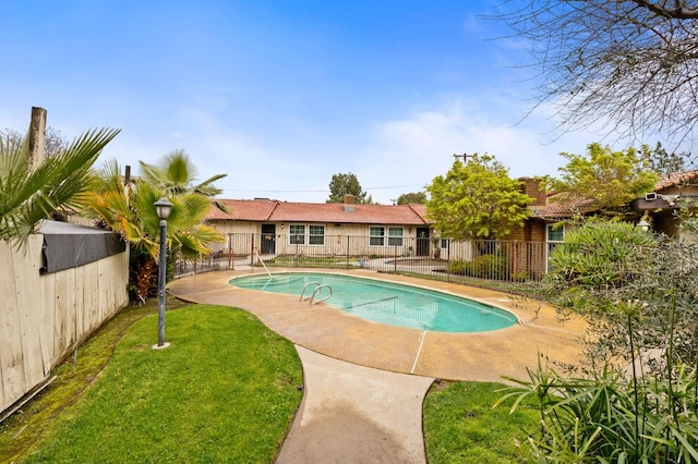 1063 Pierce Dr, Clovis, CA 93612 - view of swimming pool with a fenced backyard, a fenced in pool, a yard, and a patio area