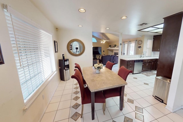 7186 N Gregory Ave, Fresno, CA 93722 - dining area featuring a ceiling fan, recessed lighting, and light tile patterned flooring