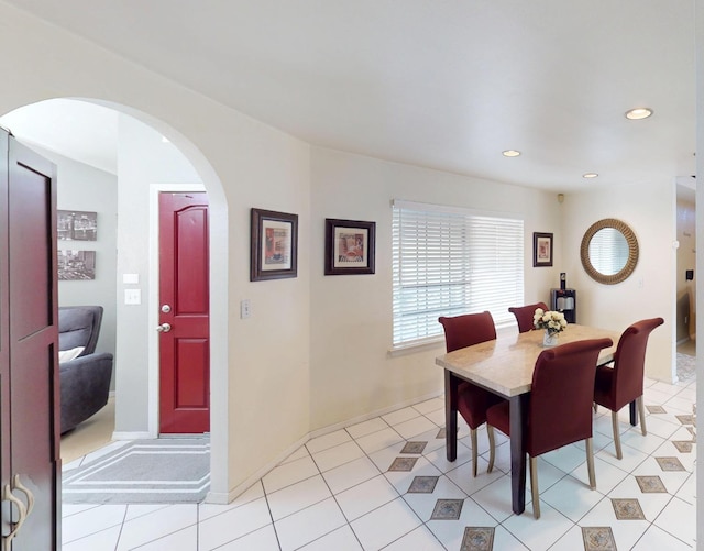 7186 N Gregory Ave, Fresno, CA 93722 - dining space featuring recessed lighting, arched walkways, and baseboards