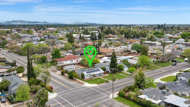 bird's eye view featuring a mountain view and a residential view