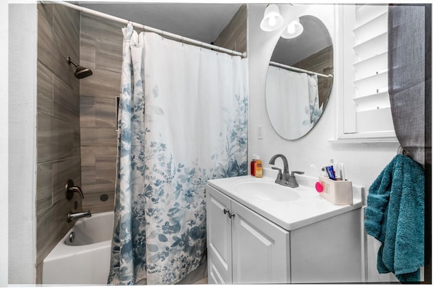 bathroom with vanity and shower / bath combo with shower curtain