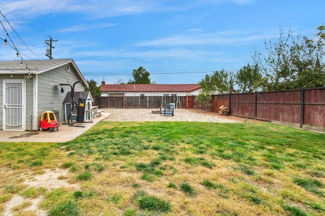 view of yard featuring a fenced backyard and a patio