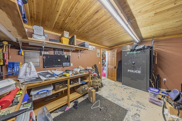 office with concrete flooring, a textured wall, and wooden ceiling