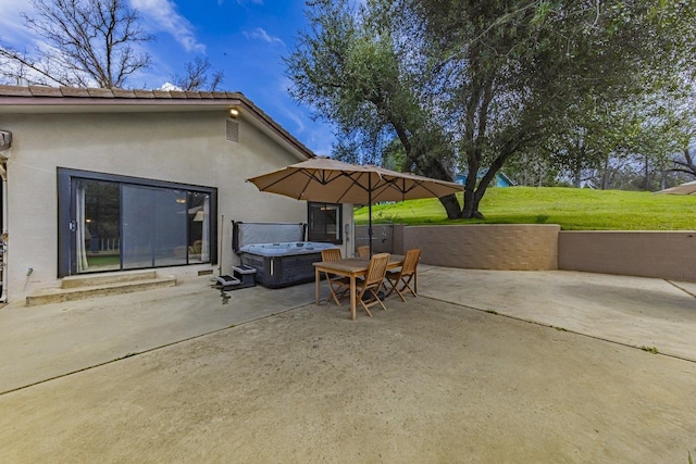view of patio featuring a hot tub