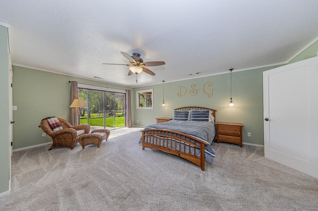 bedroom featuring access to outside, carpet flooring, ornamental molding, and visible vents