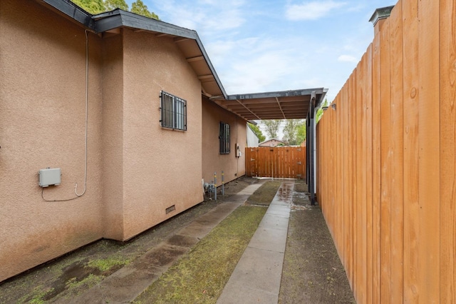 3154 E Montecito Ave, Fresno, CA 93702 - view of property exterior featuring stucco siding and crawl space
