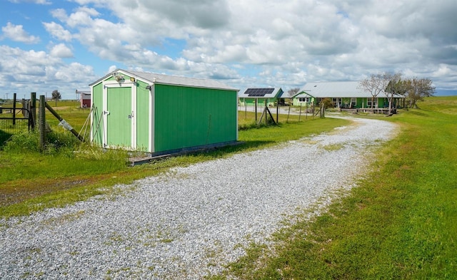 view of road with driveway