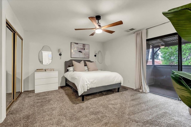 carpeted bedroom featuring visible vents, a closet, ceiling fan, and access to exterior