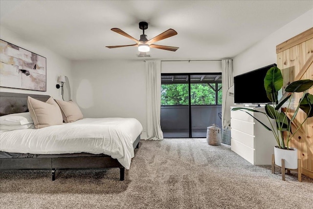carpeted bedroom featuring a ceiling fan and access to outside