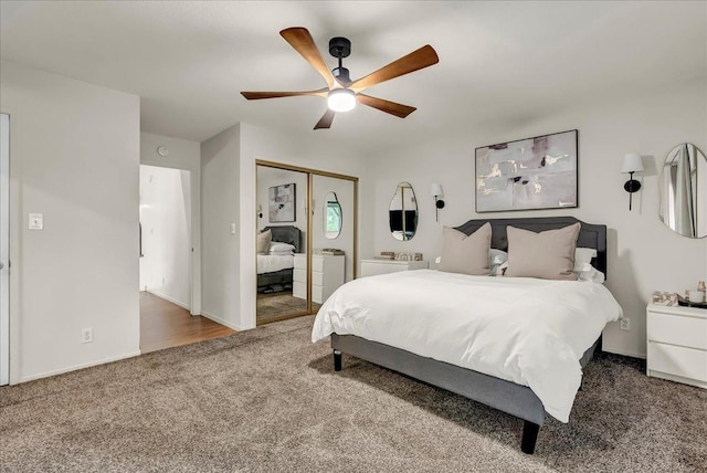 carpeted bedroom with a ceiling fan, baseboards, and a closet