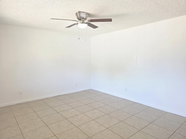 4571 N Kavanagh Ave, Fresno, CA 93705 - spare room featuring a ceiling fan, a textured ceiling, and baseboards
