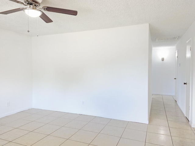 4571 N Kavanagh Ave, Fresno, CA 93705 - unfurnished room featuring ceiling fan, a textured ceiling, and light tile patterned flooring