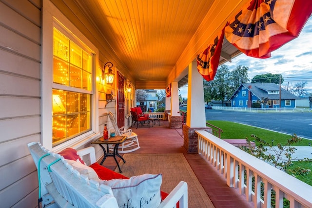 wooden deck with a porch