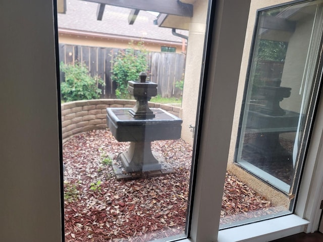 doorway to outside featuring a healthy amount of sunlight