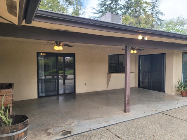 view of patio / terrace featuring ceiling fan