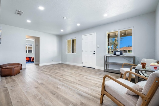 1633 W Saginaw Way, Fresno, CA 93705 - living area with recessed lighting and light wood-type flooring