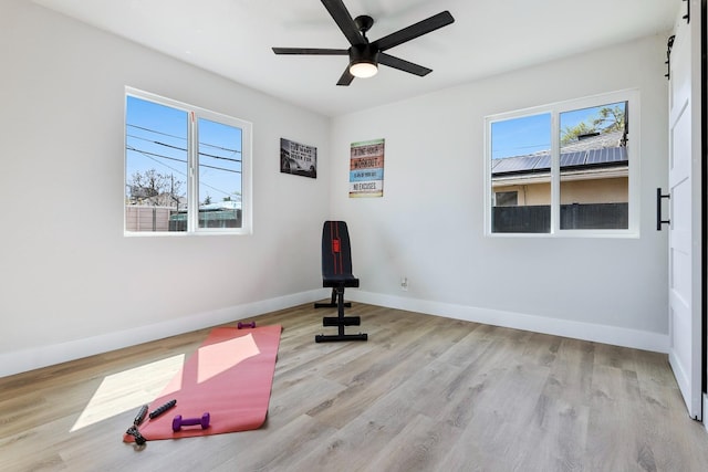 1633 W Saginaw Way, Fresno, CA 93705 - exercise area featuring plenty of natural light, a ceiling fan, and wood finished floors