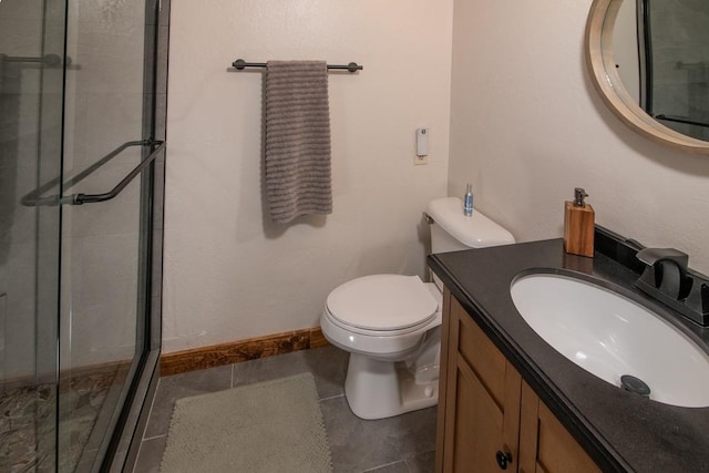 38660 Woodland Rd, Shaver Lake, CA 93664 - full bathroom with a stall shower, tile patterned floors, vanity, and toilet