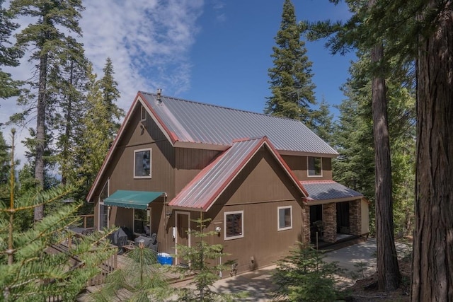 back of property with metal roof