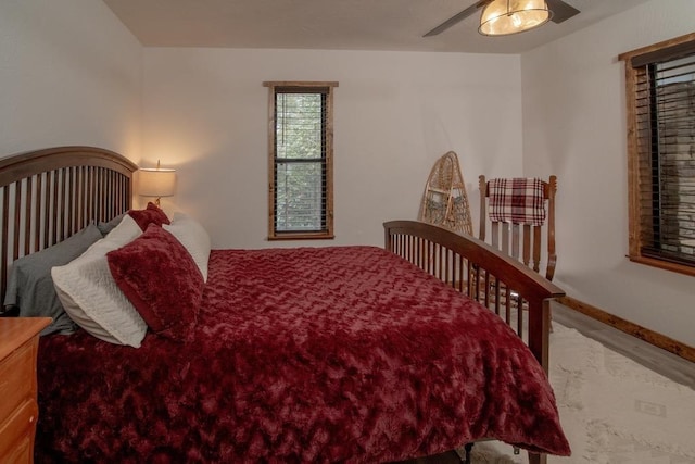 38660 Woodland Rd, Shaver Lake, CA 93664 - bedroom featuring baseboards, carpet flooring, and ceiling fan