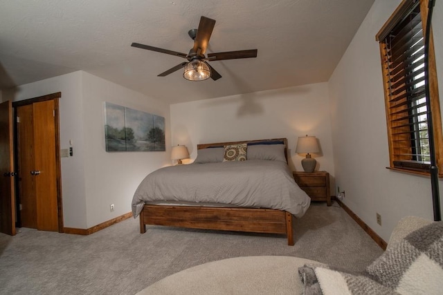 38660 Woodland Rd, Shaver Lake, CA 93664 - bedroom with carpet floors, baseboards, and ceiling fan