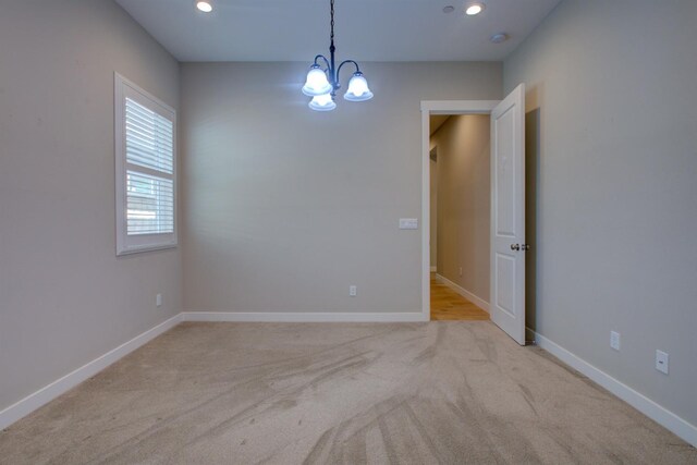 2791 E Tuolumne Rd, Turlock, CA 95382 - unfurnished room with a chandelier, baseboards, carpet, and recessed lighting