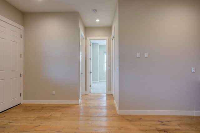 2791 E Tuolumne Rd, Turlock, CA 95382 - hallway with baseboards, recessed lighting, and light wood-style floors