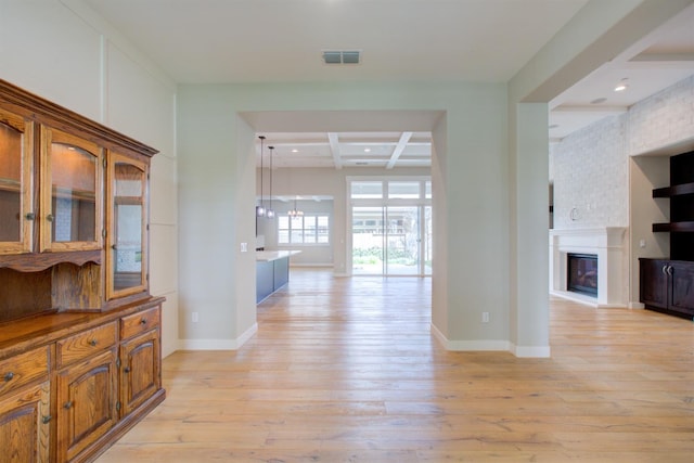 2791 E Tuolumne Rd, Turlock, CA 95382 - hallway with coffered ceiling, light wood-type flooring, beamed ceiling, baseboards, and recessed lighting